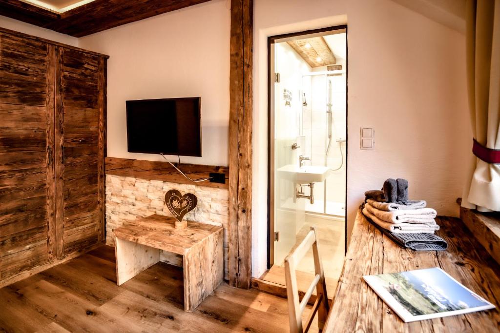 TV a/nebo společenská místnost v ubytování Gasthof Geraerhof