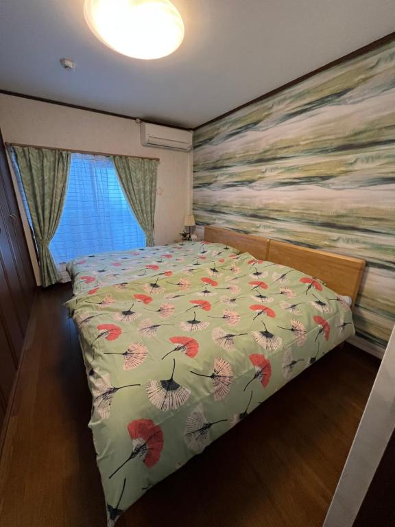 Postel nebo postele na pokoji v ubytování 舟荘