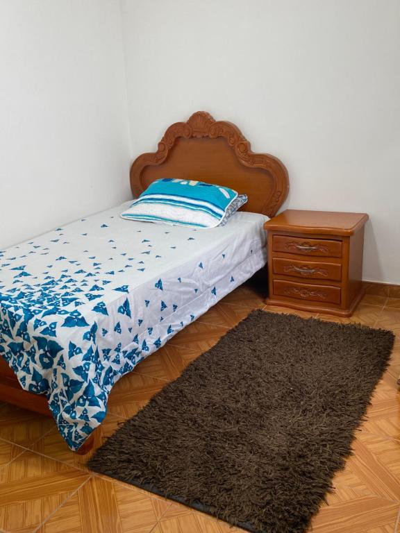 Postel nebo postele na pokoji v ubytování La Casona Hostal