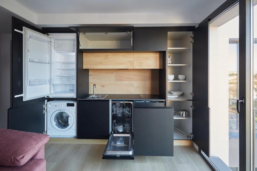 Kuchyň nebo kuchyňský kout v ubytování HAVANAAPARTAMENTOS