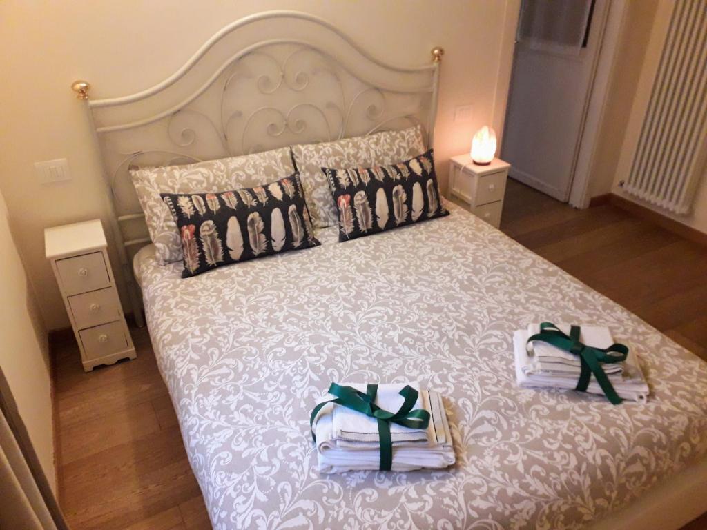 Łóżko lub łóżka w pokoju w obiekcie Casa Angie