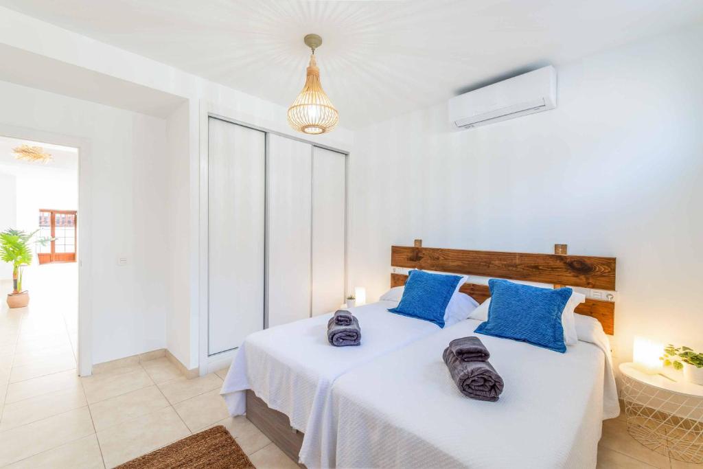 A bed or beds in a room at Villa Samui