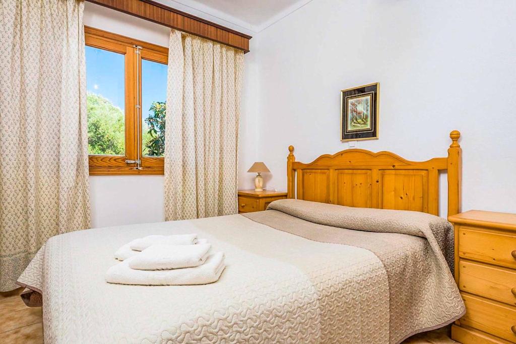 Postel nebo postele na pokoji v ubytování Villa Yesero
