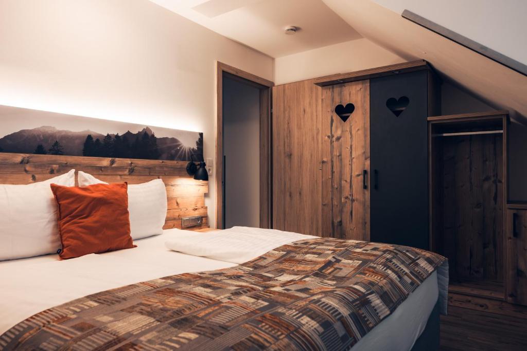 Postel nebo postele na pokoji v ubytování Ferienwohnung Nassfeld