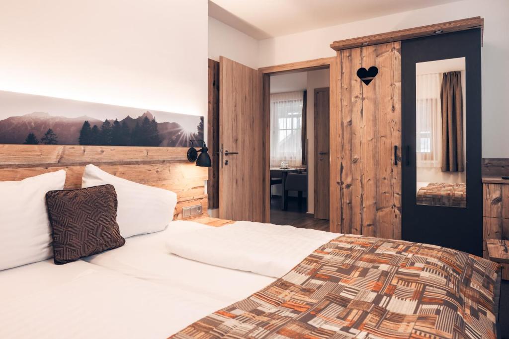 Postel nebo postele na pokoji v ubytování Ferienwohnung Nassfeld
