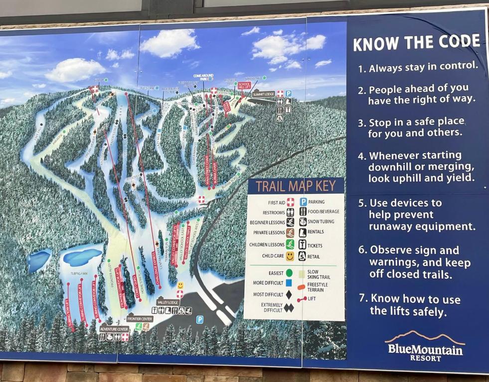 a sign for a ski resort with a ski slope at Las margaritas in Allentown