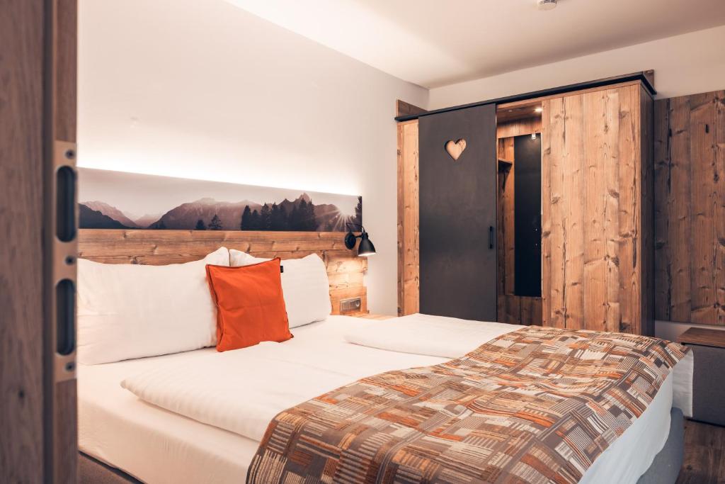Postel nebo postele na pokoji v ubytování Ferienwohnung Nassfeld