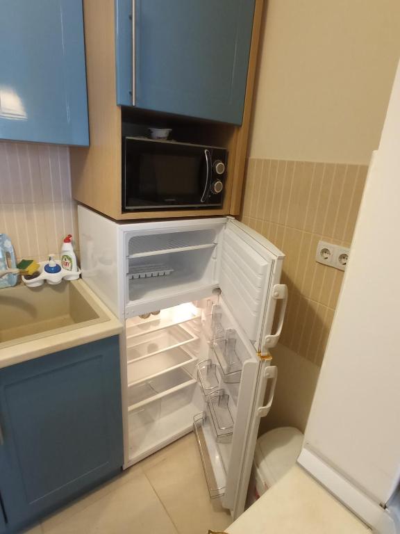 Kuchyň nebo kuchyňský kout v ubytování Apartman STANKOVIĆ