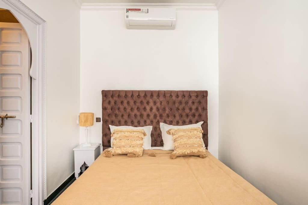 Postel nebo postele na pokoji v ubytování Riad l'Empire