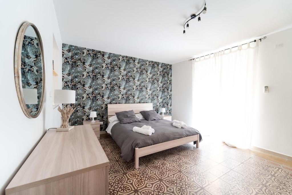Posteľ alebo postele v izbe v ubytovaní Historic Center Apartment - Catania Stays