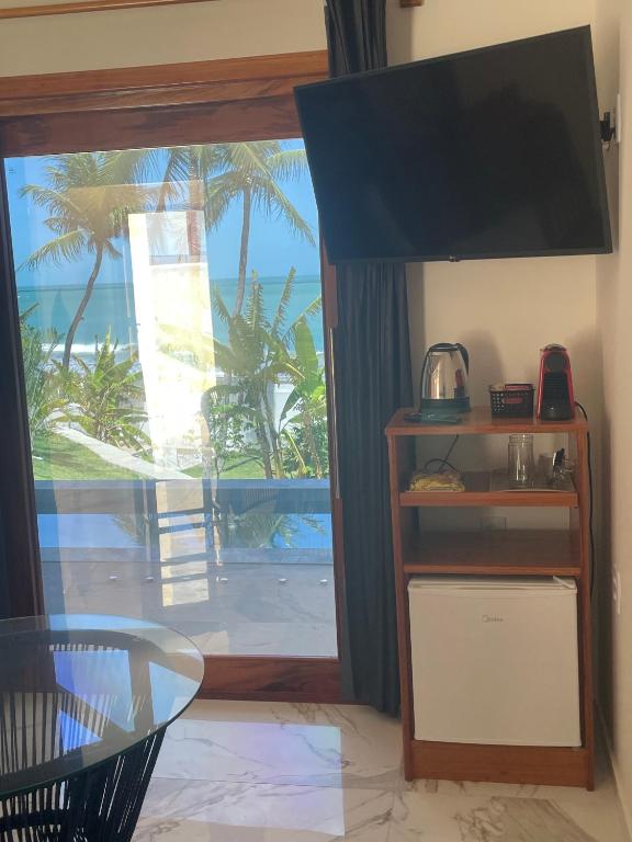 Kuchyň nebo kuchyňský kout v ubytování De Olho no Mar A única pousada de frente para o mar em Paracuru