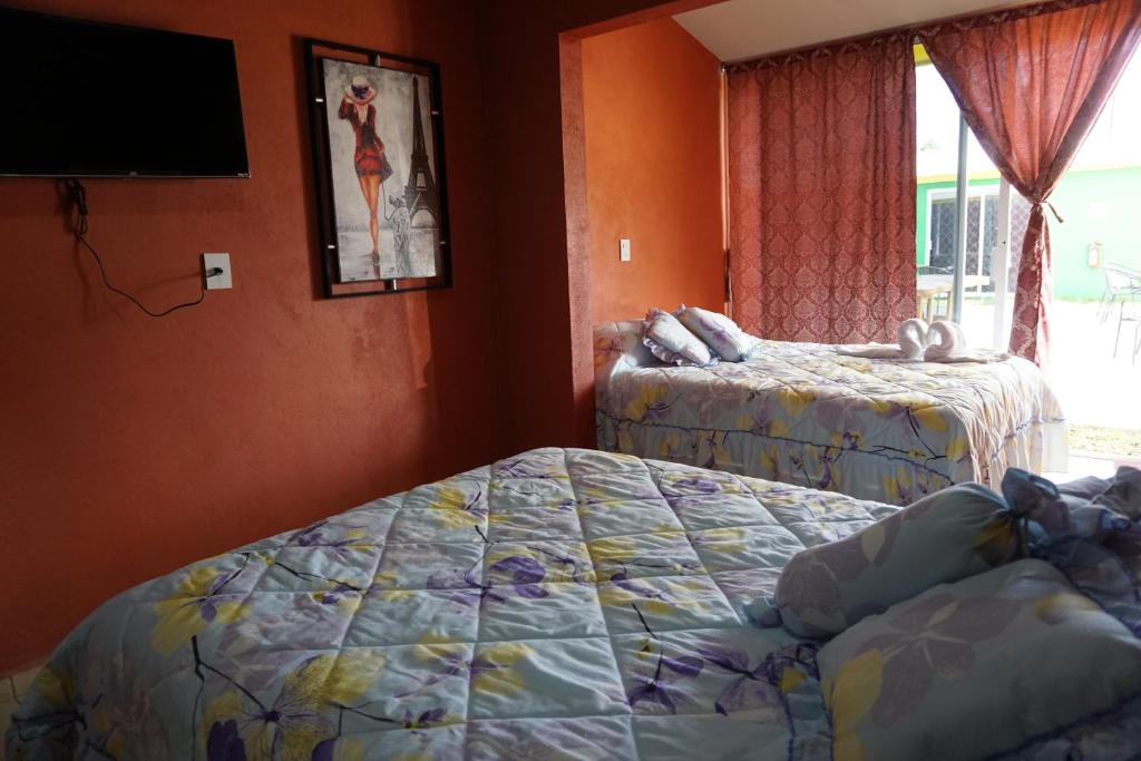 Postel nebo postele na pokoji v ubytování Velaria
