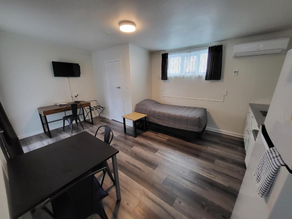 TV a/nebo společenská místnost v ubytování Rockfield Motel