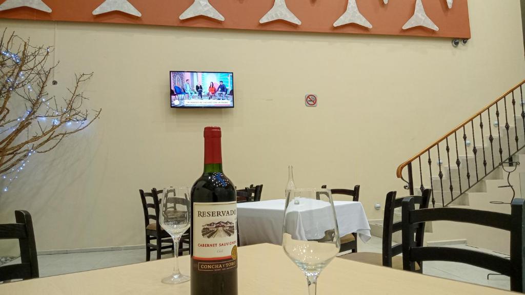 TV a/nebo společenská místnost v ubytování HOTEL PLAZA PACHUCA