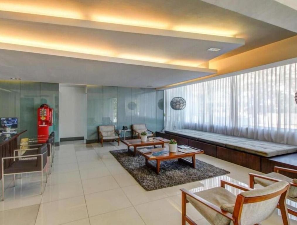 Posezení v ubytování Lincoln Suite Pool - Gym - Sauna