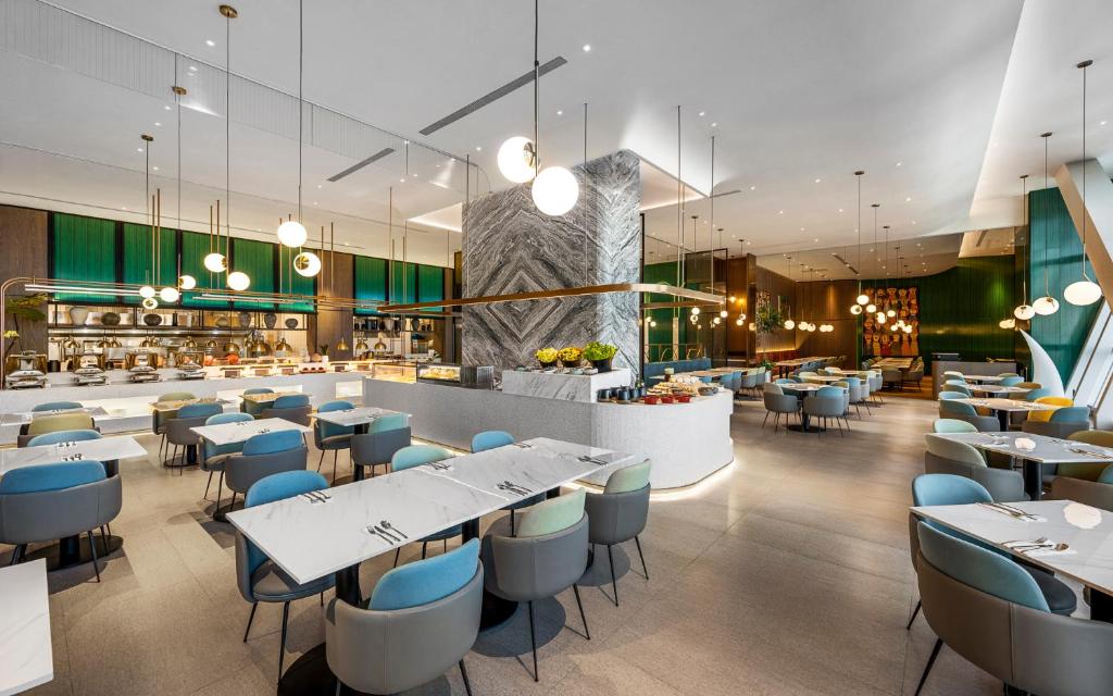 Restaurace v ubytování TAI Urban Resort