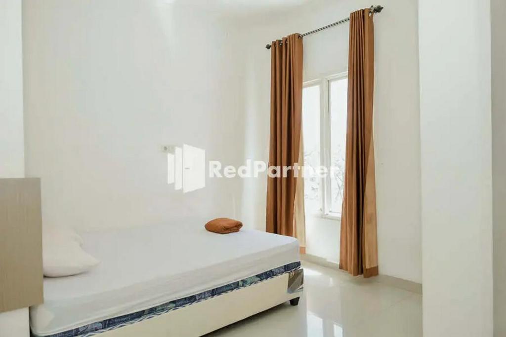 Radja Homestay Kendari RedPartner - Standard Double Room