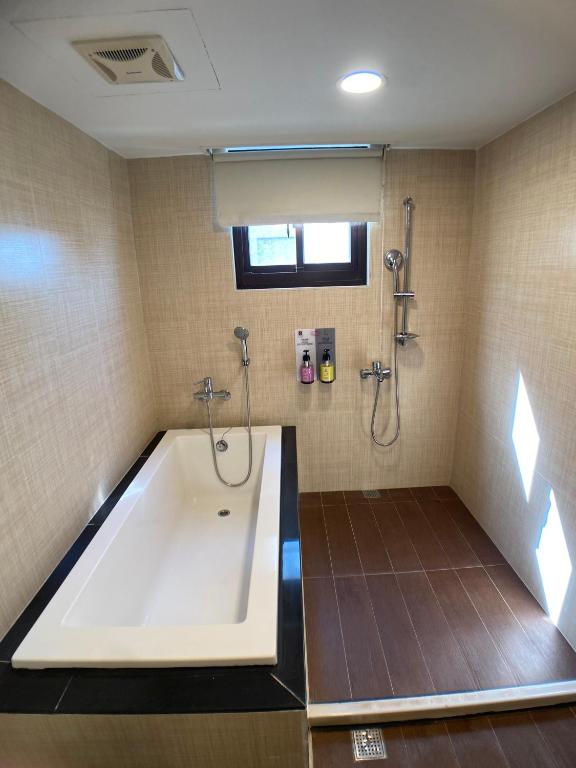 Koupelna v ubytování Bonjour Hotel