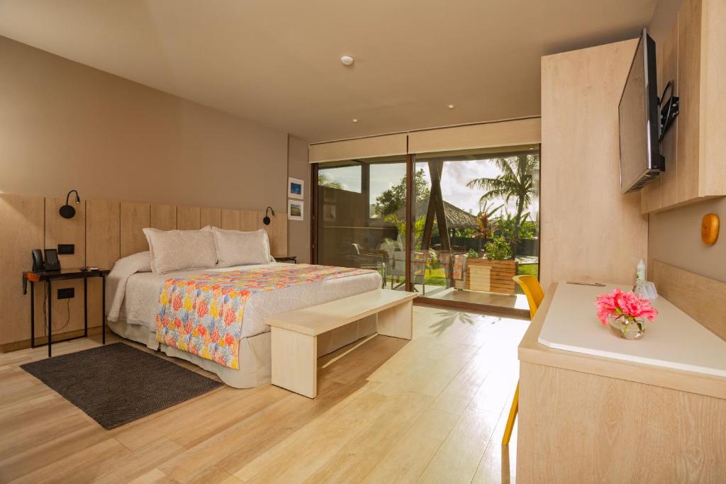 Postel nebo postele na pokoji v ubytování Hotel Ohana Rapa Nui