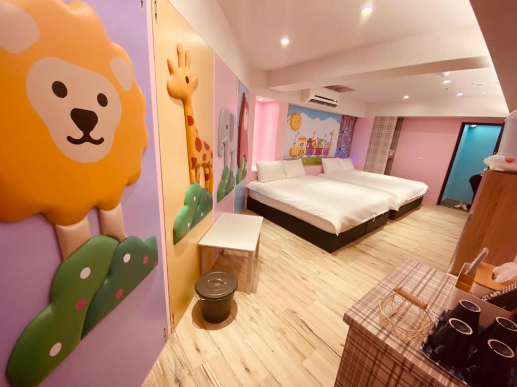 Postel nebo postele na pokoji v ubytování Have Fun Hotel