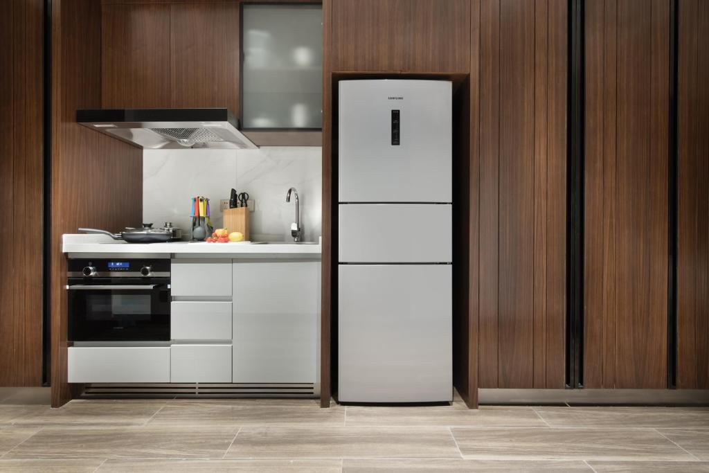 Kuchyň nebo kuchyňský kout v ubytování Oakwood Residence Foshan