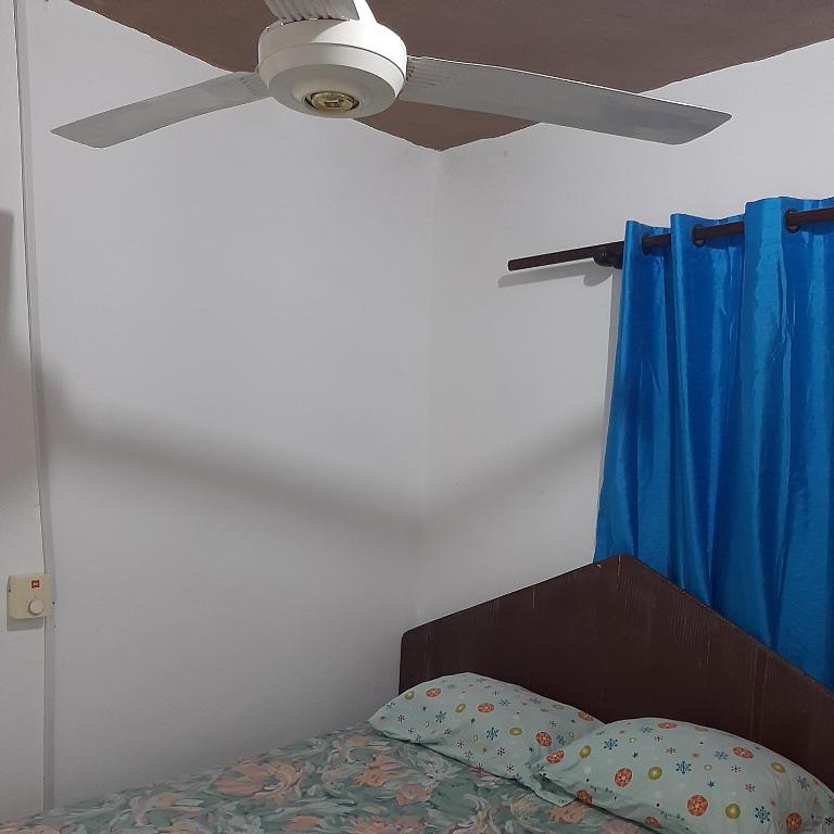 Postel nebo postele na pokoji v ubytování B&B KeisyAlba Punta Rucia