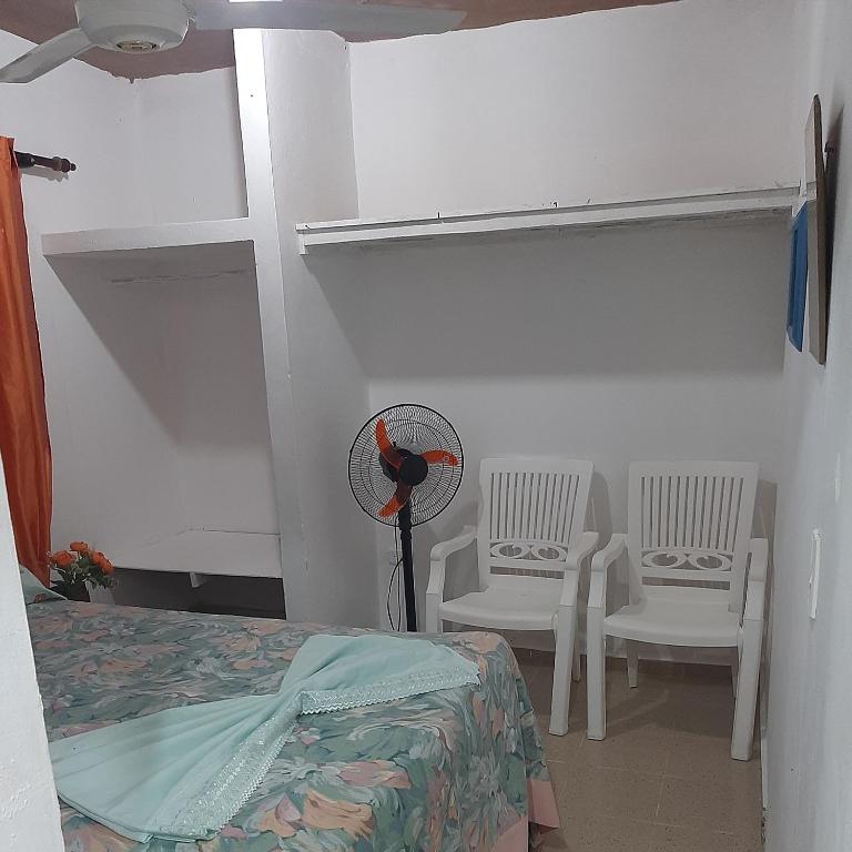 Postel nebo postele na pokoji v ubytování B&B KeisyAlba Punta Rucia