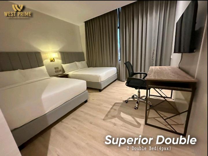 Postel nebo postele na pokoji v ubytování West Prime Hotel