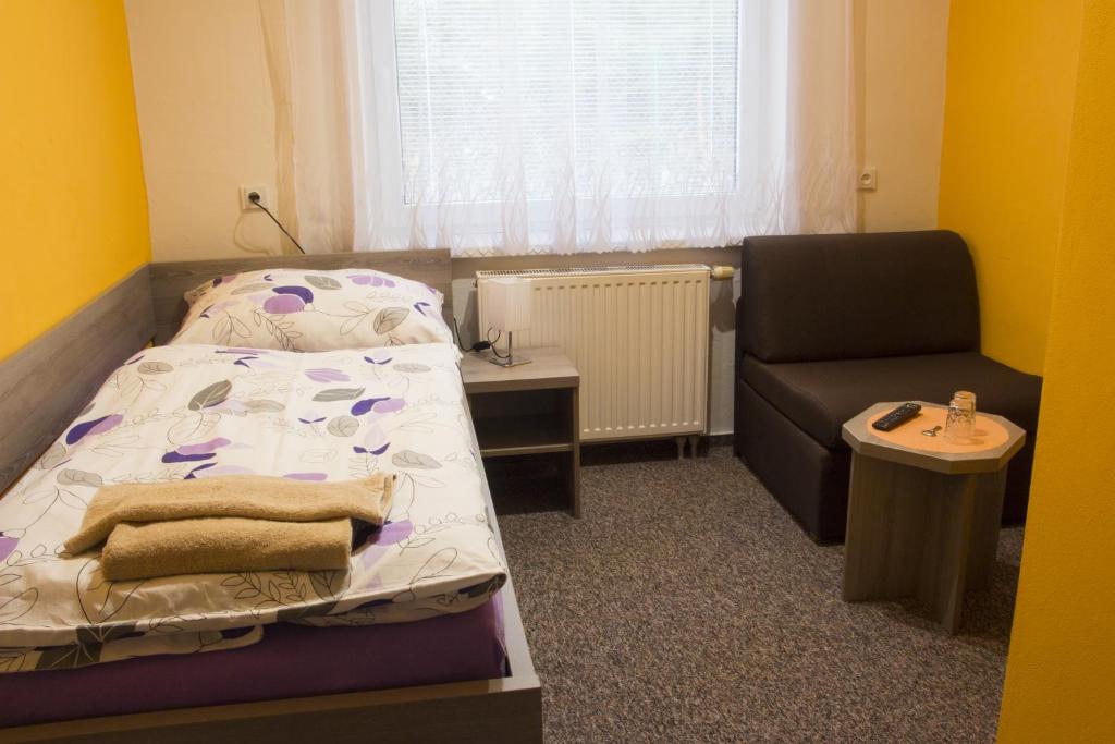 Letto o letti in una camera di Motel Pávov