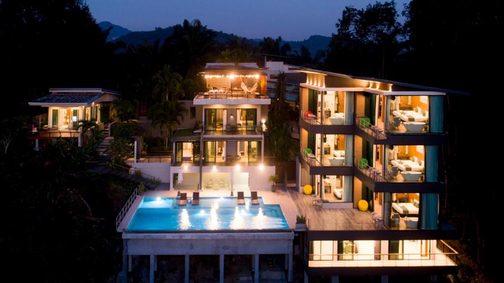 an aerial view of a house at night at Ao Luek Panoramic Pool-SHA Plus in Ao Luk
