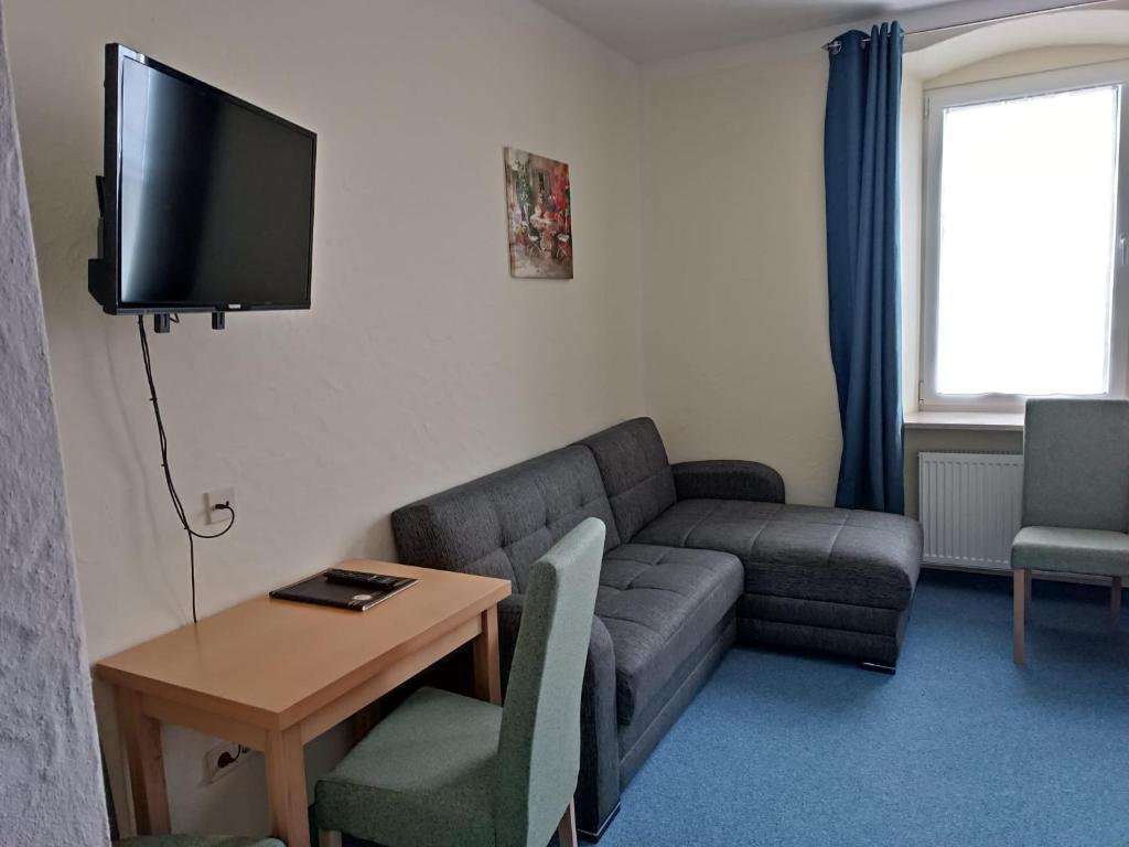 Posezení v ubytování Garni Hotel Post