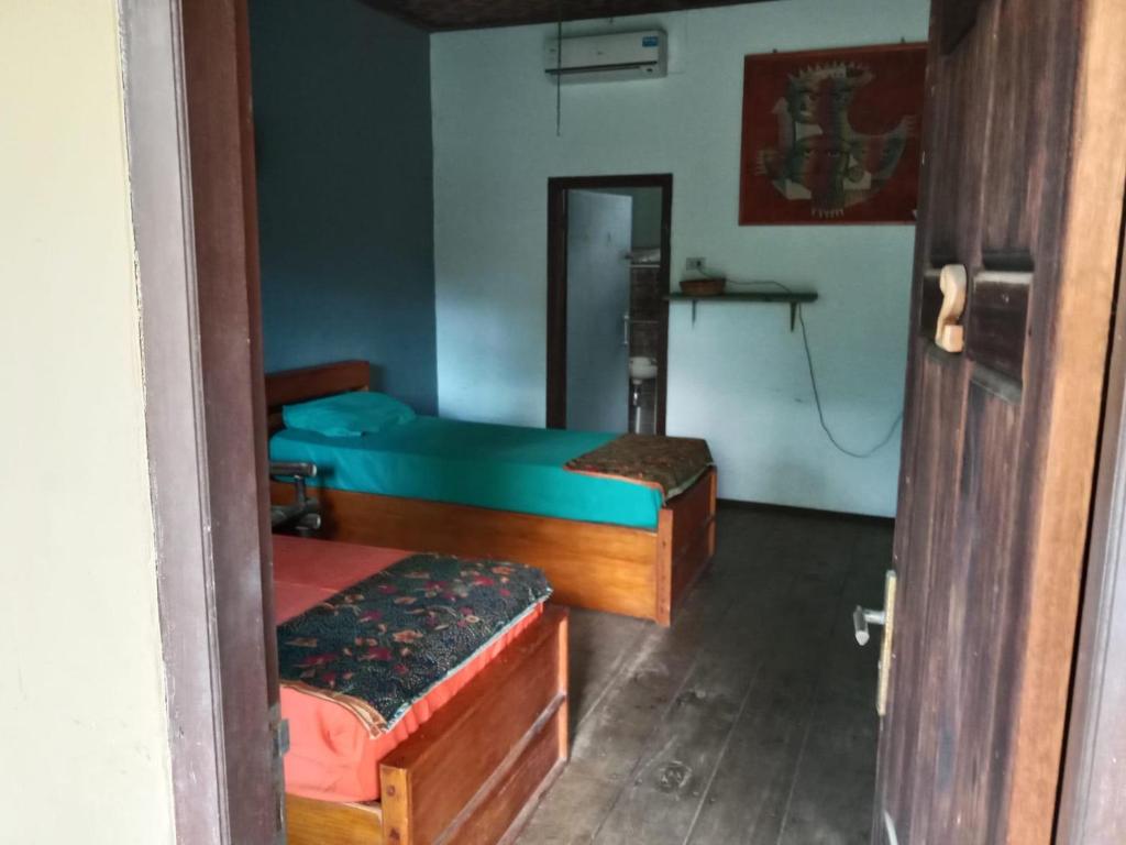 Postel nebo postele na pokoji v ubytování C Point Krui