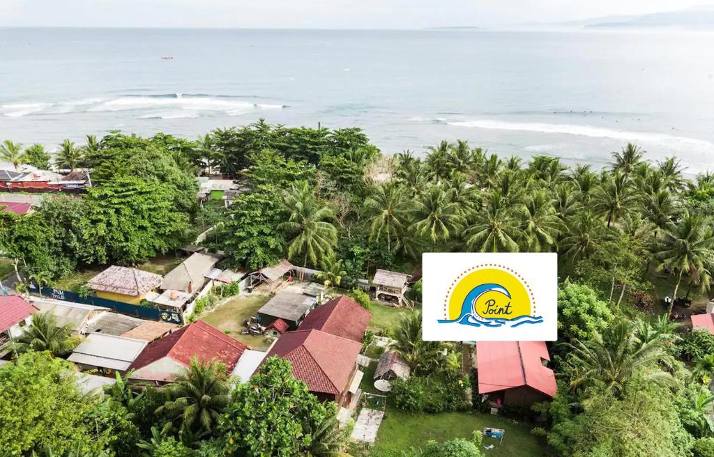 an aerial view of a resort with a sign at C Point Krui in Krui