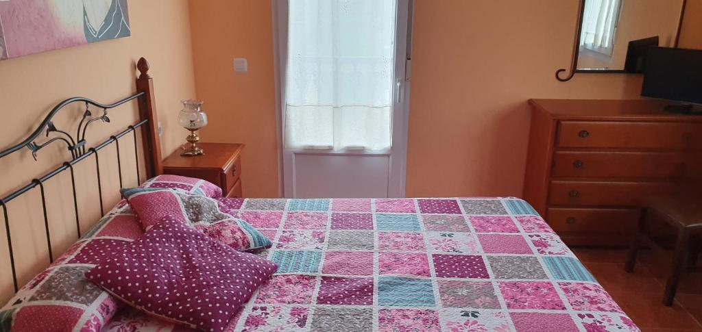 Posteľ alebo postele v izbe v ubytovaní Casa César