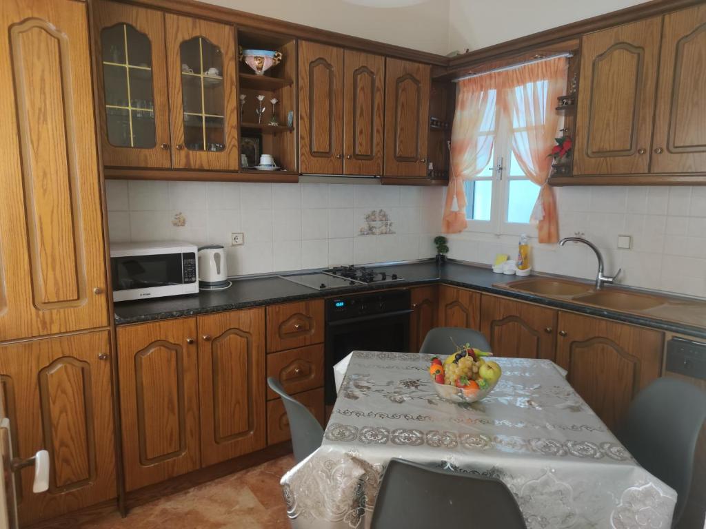 Kuchyň nebo kuchyňský kout v ubytování Marios Apartment