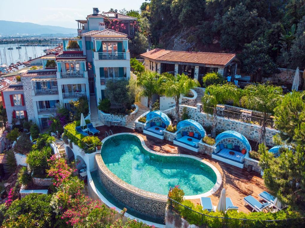 an aerial view of a resort with a swimming pool at Hotel Unique-Boutique Class - Adults Only in Fethiye