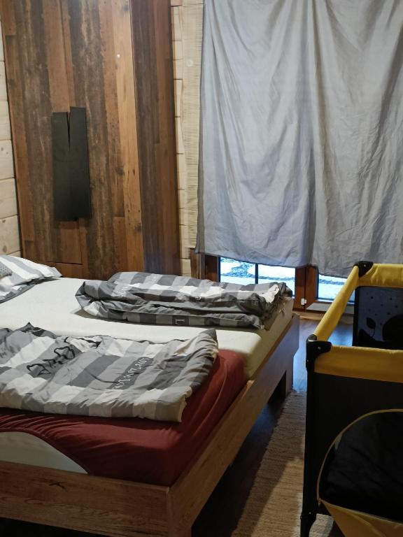Postel nebo postele na pokoji v ubytování Chata Peťo