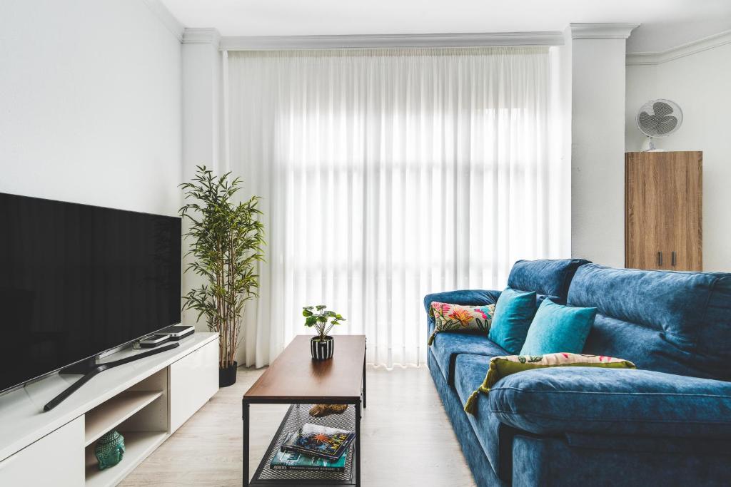 Televízia a/alebo spoločenská miestnosť v ubytovaní Home2Book Design Cool Center Apt Las Palmas
