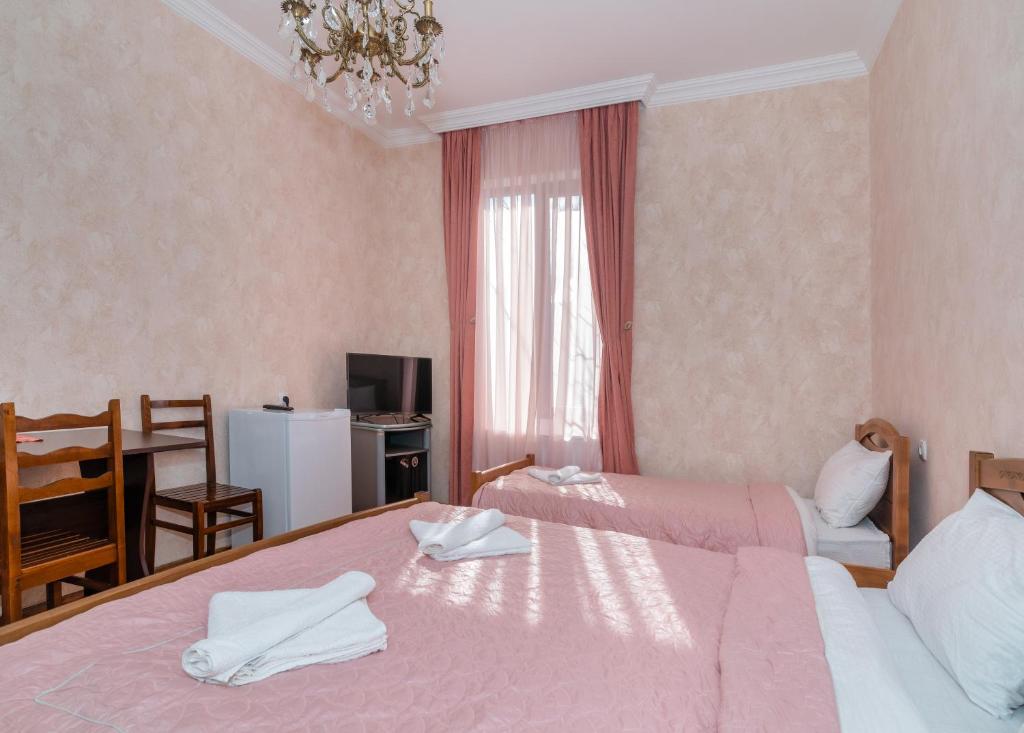 Llit o llits en una habitació de Gogichas tower