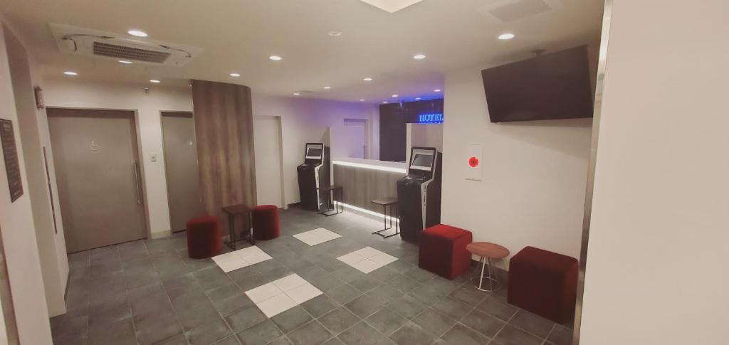 TV a/nebo společenská místnost v ubytování HOTEL LiVEMAX Kamata Ekimae