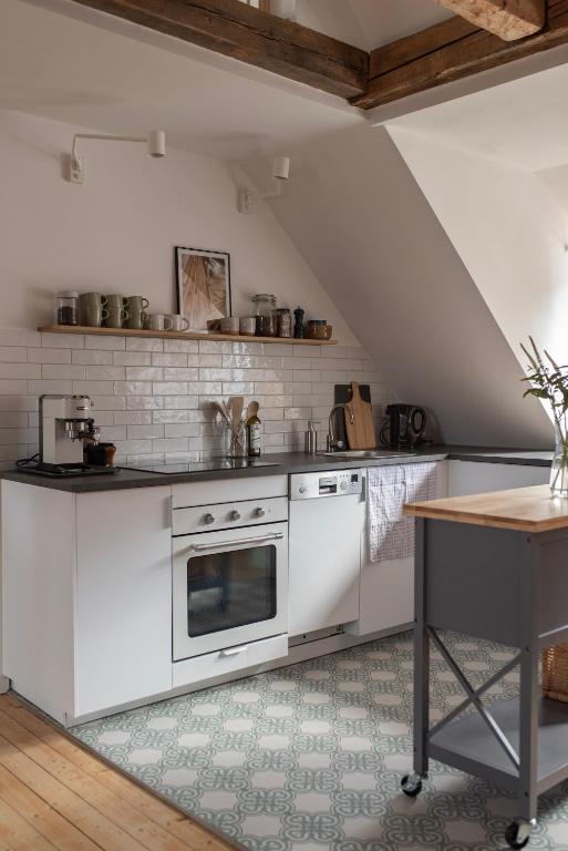 Kuchyň nebo kuchyňský kout v ubytování Altbau Appartement - klein aber oho