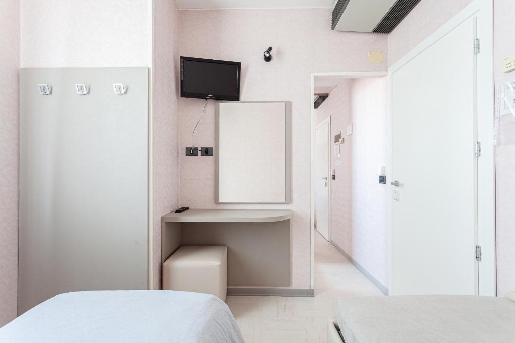 TV a/nebo společenská místnost v ubytování Hotel Belturismo