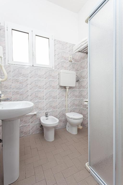 Koupelna v ubytování Hotel Belturismo