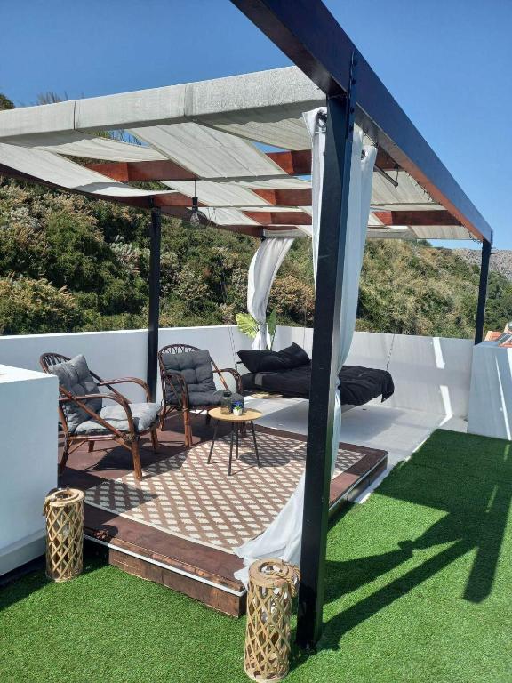 Patio alebo iná vonkajšia časť ubytovania Kalyves Bay