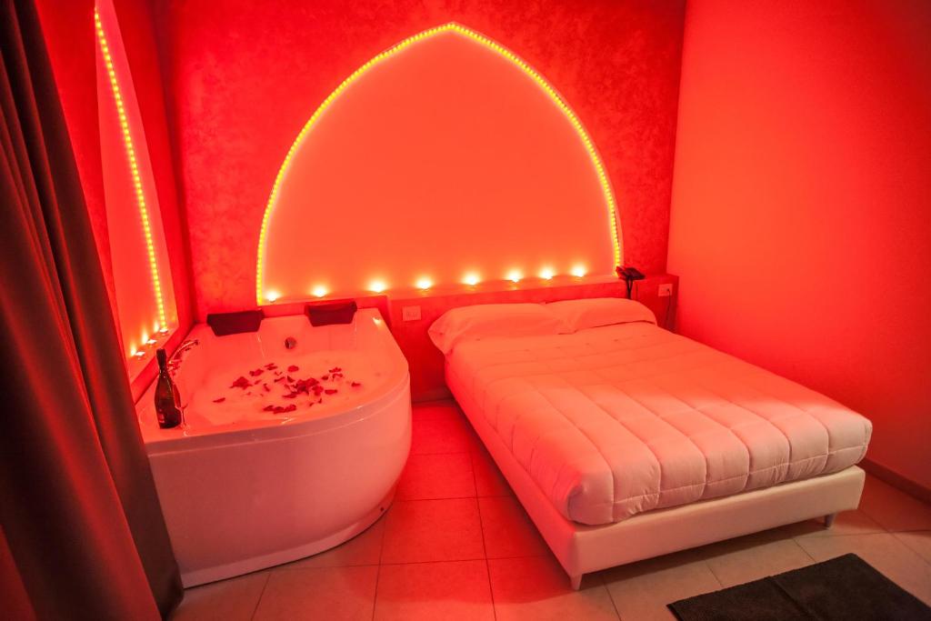 Postel nebo postele na pokoji v ubytování Hotel Oceanomare