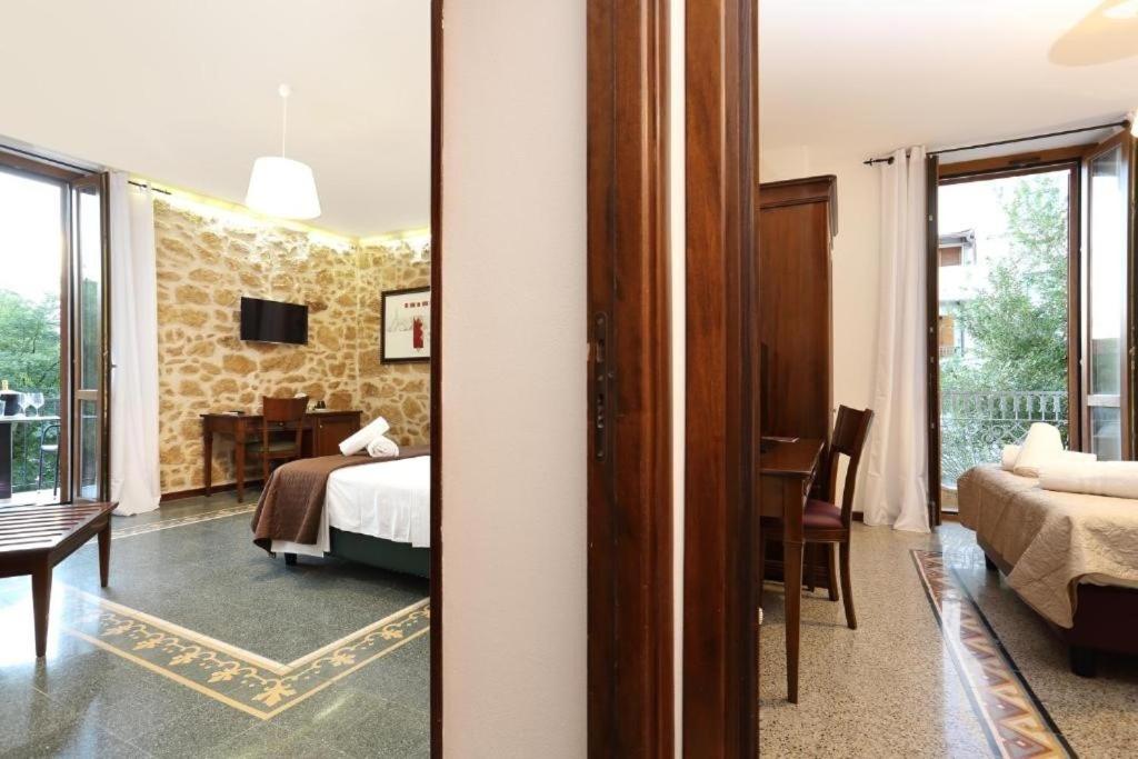 Postel nebo postele na pokoji v ubytování Double B Maison De Charme