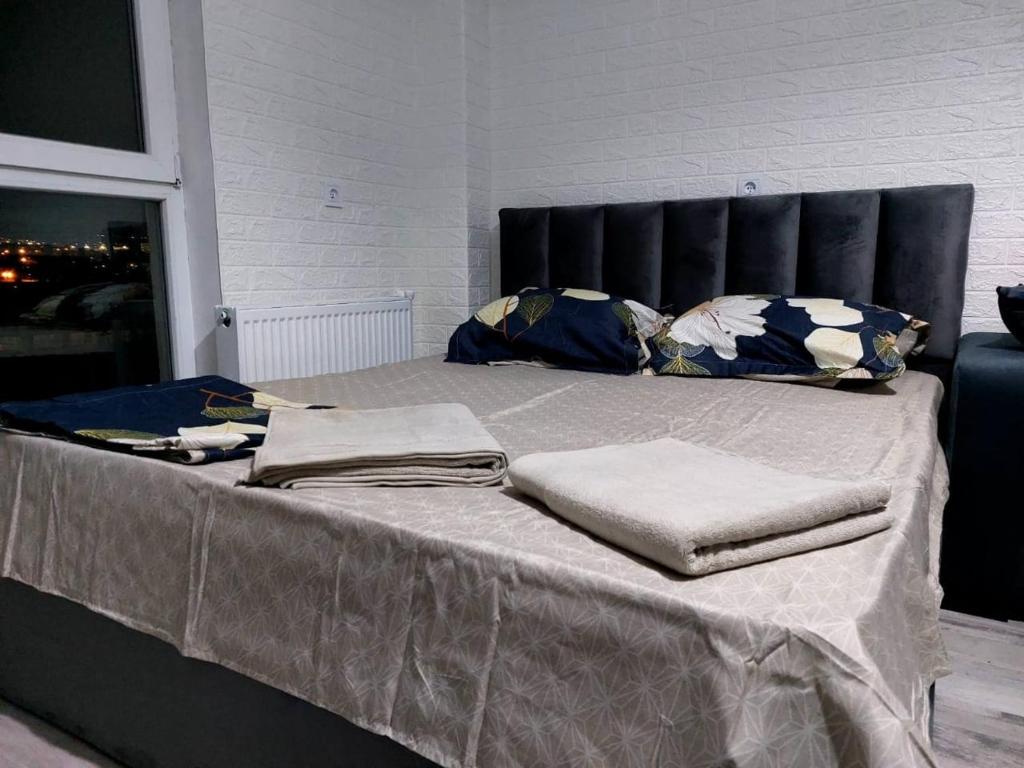 Llit o llits en una habitació de Appartament Samgori