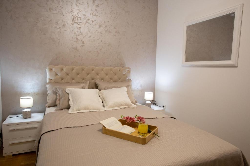 Postel nebo postele na pokoji v ubytování Apartman SUNSET