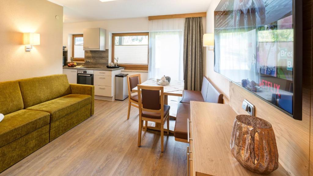 A kitchen or kitchenette at BIRKENHOF premium apart & suites