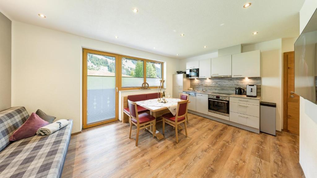 A kitchen or kitchenette at BIRKENHOF premium apart & suites